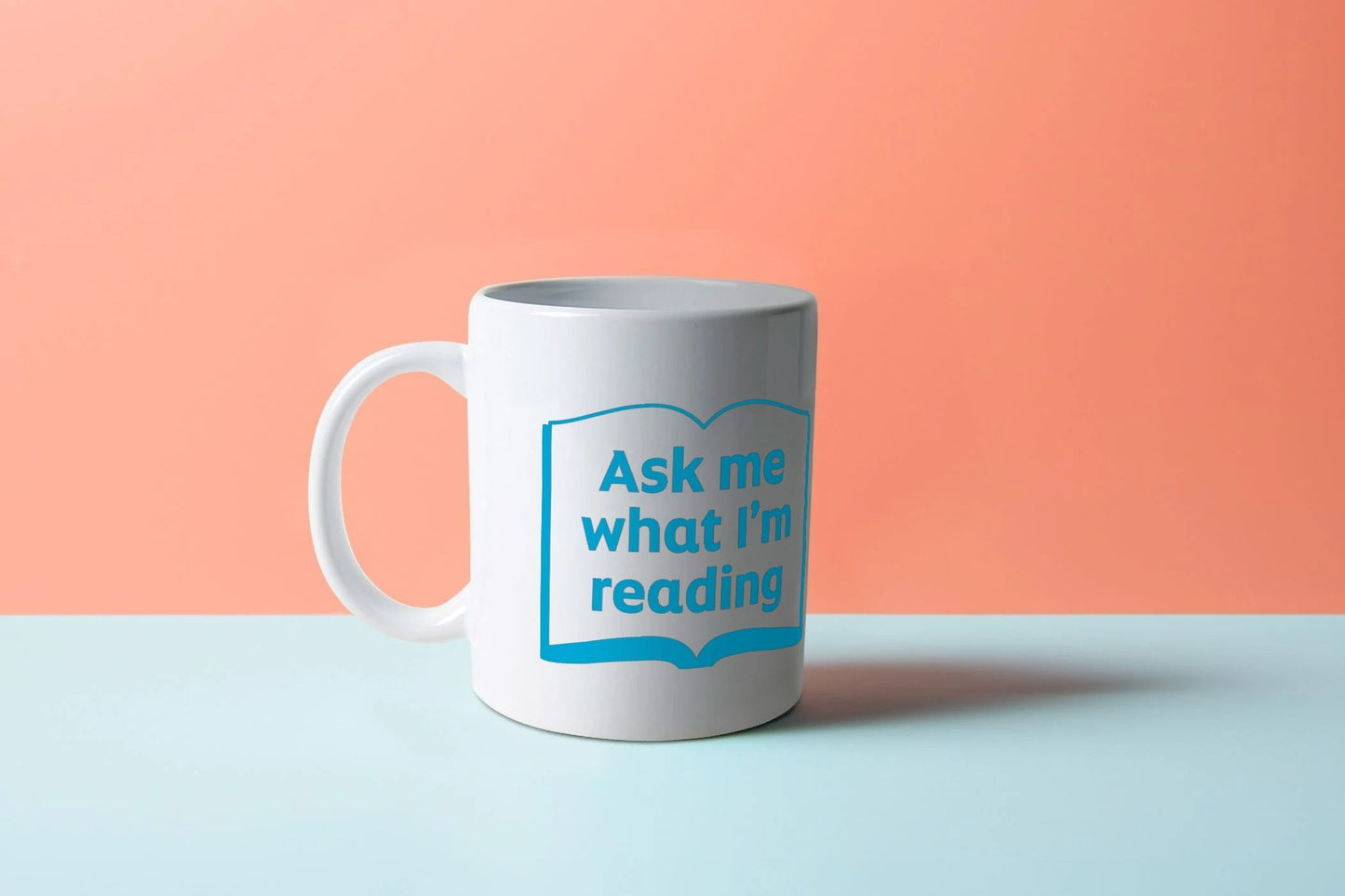 'Ask me what I'm reading' mug