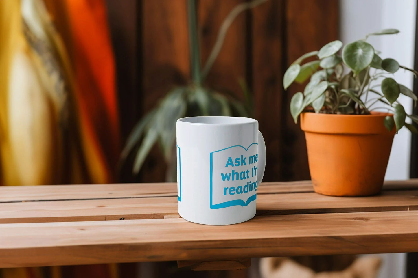 'Ask me what I'm reading' mug