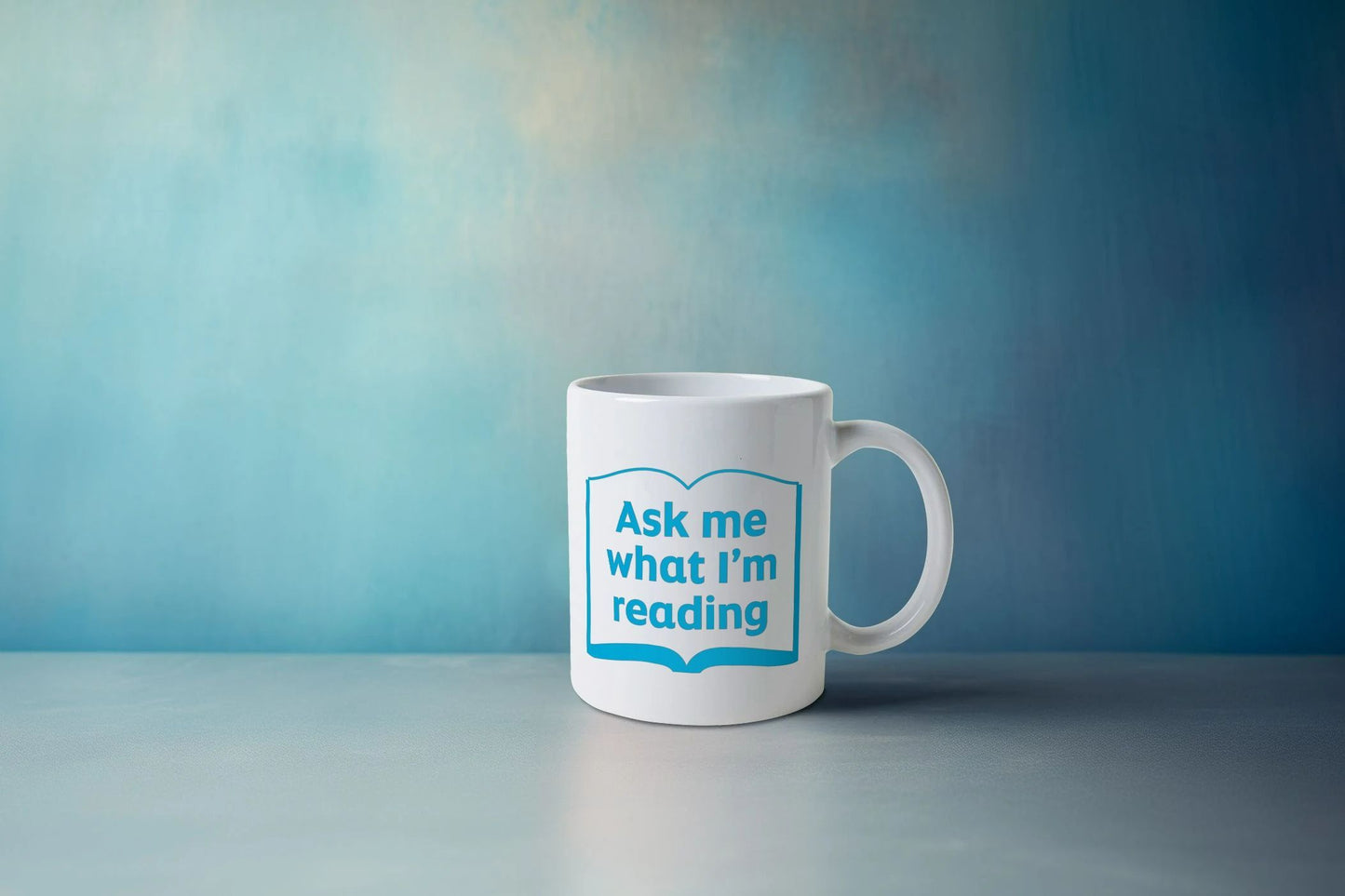 'Ask me what I'm reading' mug