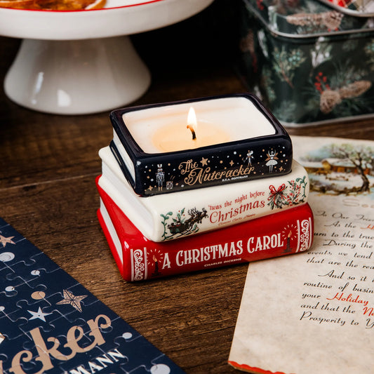 Christmas classics stacked books candle