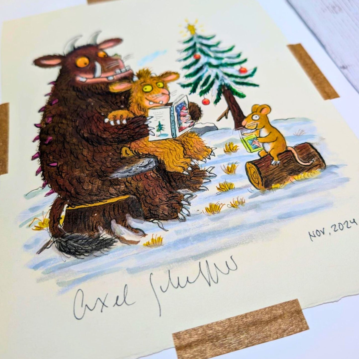 'The Gruffalo family shares a story at Christmas' – Axel Scheffler